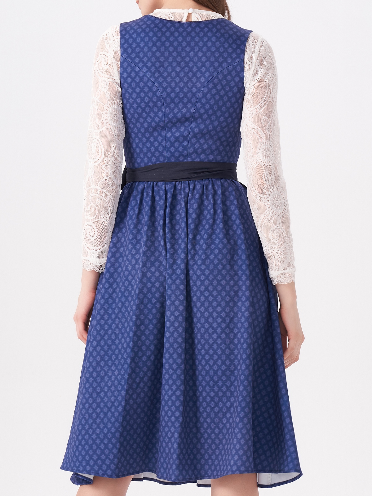 Dunkelgrünes Dirndl mit blumiger Schürze